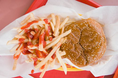 hamburger and french fries on a fast food tray - junk food stock pictures, royalty-free photos & images