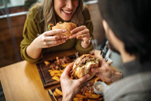 hamburger for two - junk food stock pictures, royalty-free photos & images