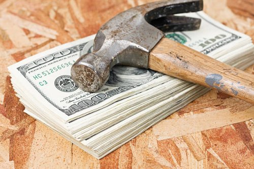 hammer on stack of money - home decoration stock pictures, royalty-free photos & images