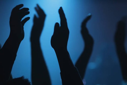 hand clapping - concert stock pictures, royalty-free photos & images