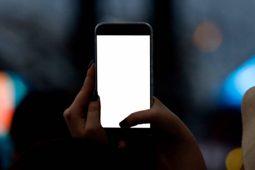 hand holding smartphone photographing live concert , people taking photographs with smart phone during a music entertainment event - concert stock pictures, royalty-free photos & images