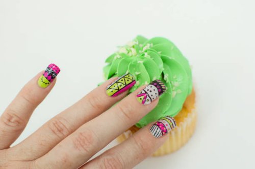 hand showing design nail art and a cupcake - nails art stock pictures, royalty-free photos & images
