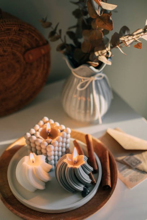 handmade natural wax and soy burning candles. - home decoration stock pictures, royalty-free photos & images