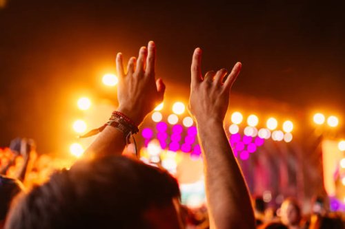hands in air at concert - concert stock pictures, royalty-free photos & images