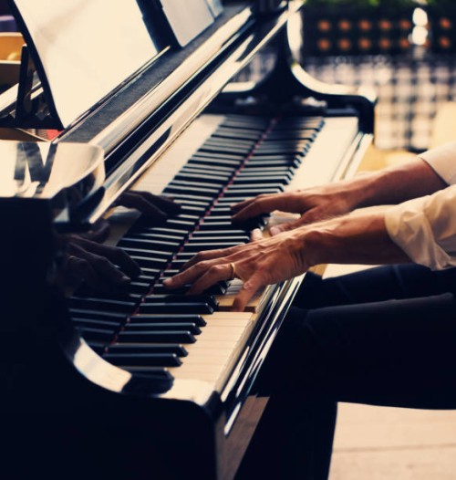 hands playing a grand piano - concert stock pictures, royalty-free photos & images