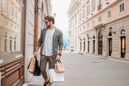 handsome young man in shopping - fashion stock pictures, royalty-free photos & images