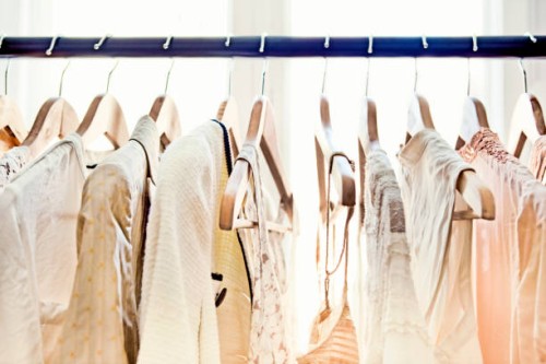 hangers with clothes - fashion stock pictures, royalty-free photos & images
