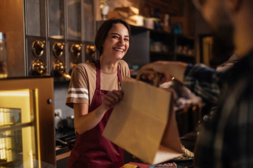 happiness while serving customer - junk food stock pictures, royalty-free photos & images