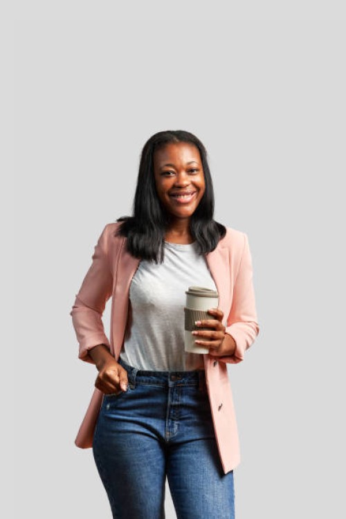 happy african woman with a take away coffee in her hand - junk food stock pictures, royalty-free photos & images