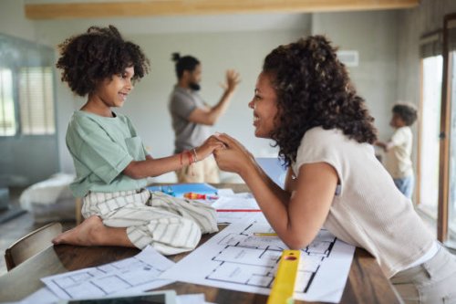happy black mother and daughter talking during renovation process. - home decoration stock pictures, royalty-free photos & images