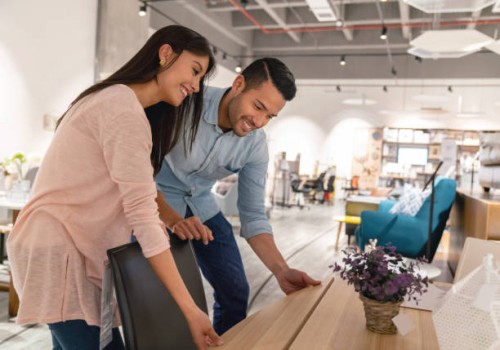 happy couple shopping at a furniture store - home decoration stock pictures, royalty-free photos & images
