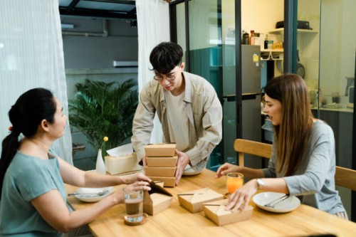 happy family enjoy eating in a lunch time at home in holiday. - junk food stock pictures, royalty-free photos & images