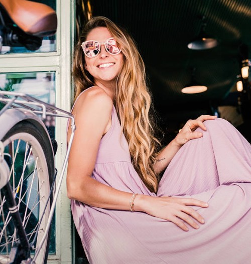happy girl with a bicycle - fashion stock pictures, royalty-free photos & images