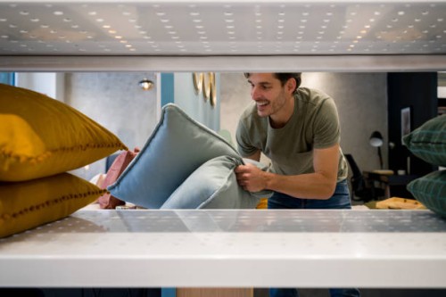 happy man shopping at a furniture store - home decoration stock pictures, royalty-free photos & images