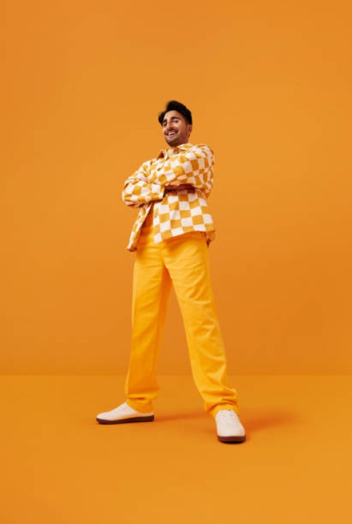 happy man with vitiligo standing with arms crossed - fashion stock pictures, royalty-free photos & images