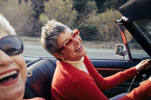 happy mature women driving in convertible car - travel stock pictures, royalty-free photos & images