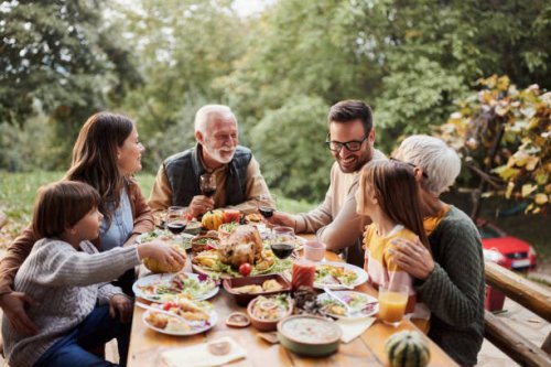 happy multi-generation family enjoying in lunch on a terrace. - food stock pictures, royalty-free photos & images
