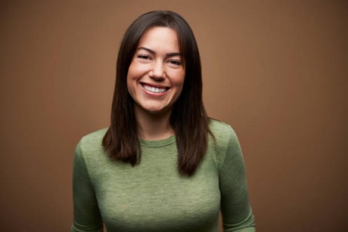 happy woman against brown background - fashion stock pictures, royalty-free photos & images