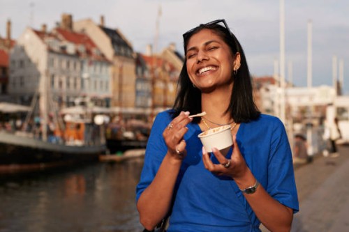 happy young woman with ice cream cup - food stock pictures, royalty-free photos & images