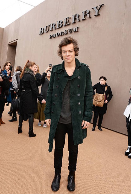 Harry Styles arrives at Burberry Womenswear Autumn/Winter 2014 at Kensington Gardens on February 17, 2014 in London, England.
