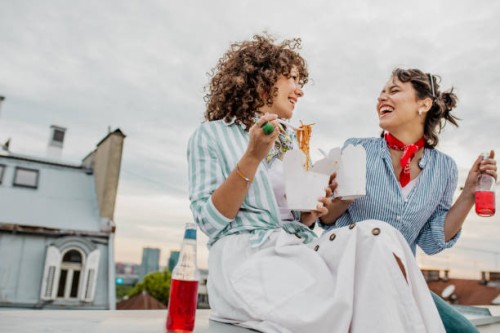 having a great time on the rooftop - junk food stock pictures, royalty-free photos & images