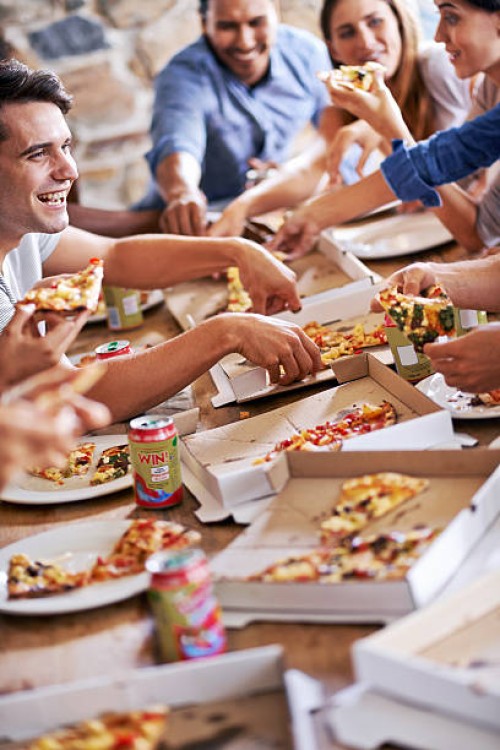 having a great time with good food and amazing friends - junk food stock pictures, royalty-free photos & images