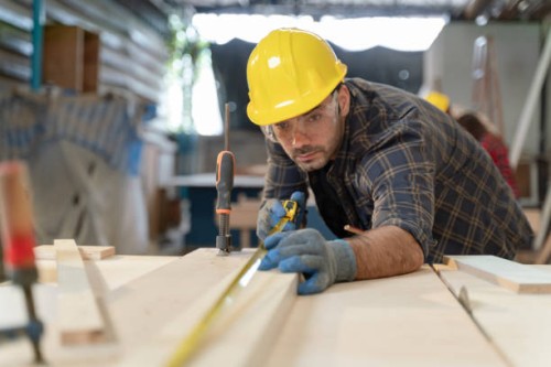 he is wearing a blue and black plaid shirt - home decoration stock pictures, royalty-free photos & images