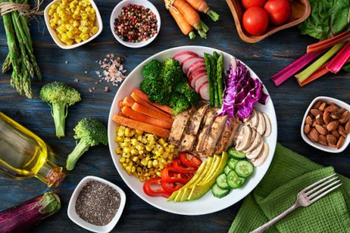 healthy eating and diet concepts. top view of spring salad shot from above on rustic wood table. - food stock pictures, royalty-free photos & images