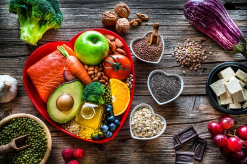 healthy food for lower cholesterol and heart care shot on wooden table - food stock pictures, royalty-free photos & images