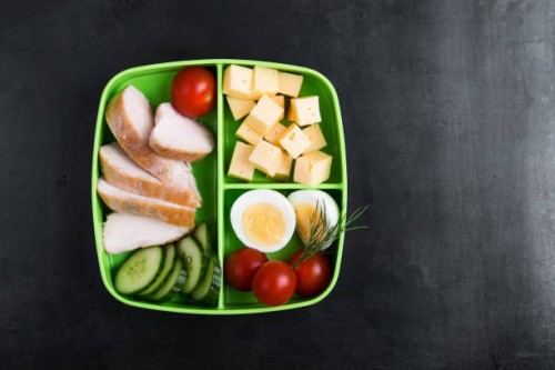 healthy protein snack box with chicken breast, cheese, hardboiled eggs - food stock pictures, royalty-free photos & images