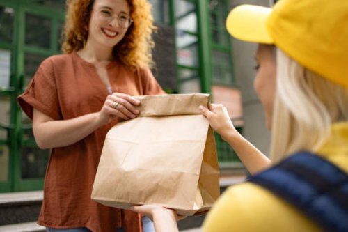 here is your delivery! - junk food stock pictures, royalty-free photos & images