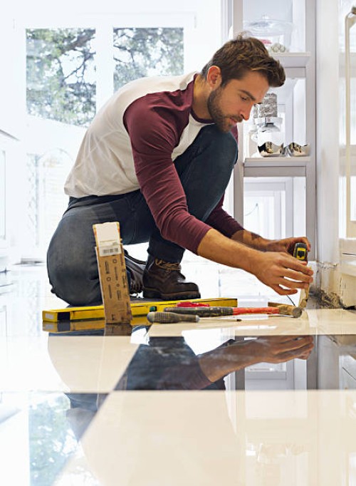 his diy skills will floor you - home decoration stock pictures, royalty-free photos & images