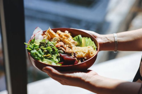 holding a bowl of chicken salad - food stock pictures, royalty-free photos & images