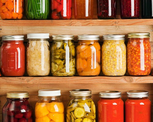 home canning fruit and vegetable food preserves in storage shelves - food stock pictures, royalty-free photos & images