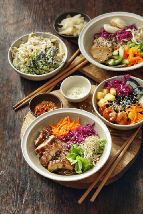 homemade poke bowls and glass noodle salad - junk food stock pictures, royalty-free photos & images