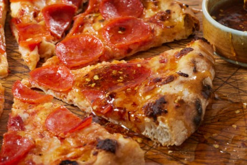hot honey pepperoni pizza - junk food stock pictures, royalty-free photos & images