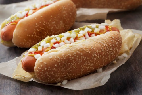 hotdog with, ketchup, mustard, relish, onions and potato chips - junk food stock pictures, royalty-free photos & images