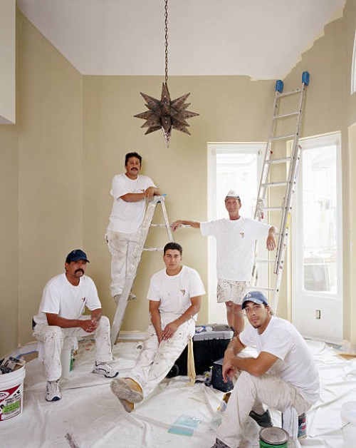 house painters in freshly painted room - home decoration stock pictures, royalty-free photos & images