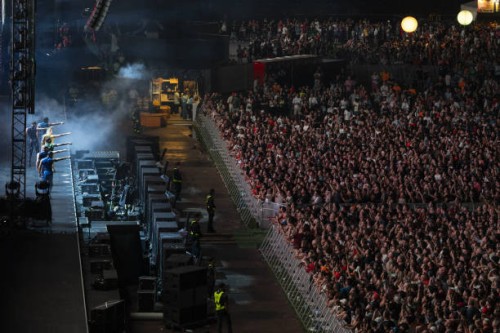 Hundreds of fans watch Australian pop star Kylie Minogue's concert during the Formula 1 Singapore Grand Prix at the Marina Bay Street Circuit in...
