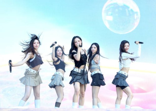 Hyein, Hanni, Minji, Haerin and Danielle of NewJeans perform in concert during Lollapalooza at Grant Park on August 03, 2023 in Chicago, Illinois.