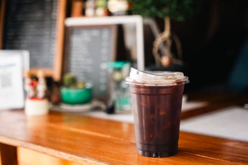 iced americano black coffee in hot day - junk food stock pictures, royalty-free photos & images