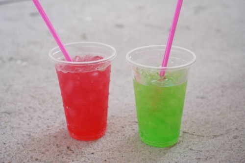 iced red soda in plastic cup - junk food stock pictures, royalty-free photos & images