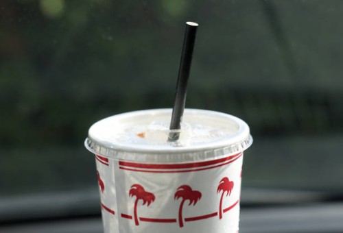In this photo illustration, a paper straw is seen in a fast food drink cup on February 07, 2025 in Studio City, California. U.S. President Donald...
