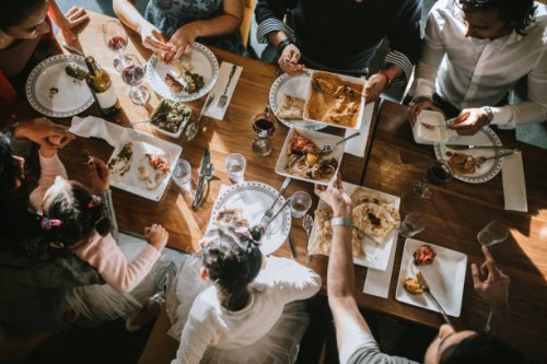 indian friends and family share traditional meal together - food stock pictures, royalty-free photos & images