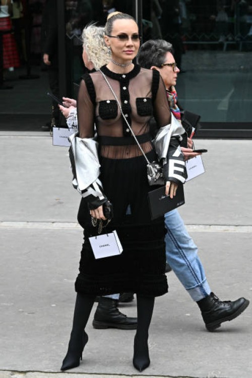 Influencer Svetlana Sava Savitskaia leaves after the presentation of creations by Chanel for the Women Ready-to-wear Fall-Winter 2024/2025 collection...