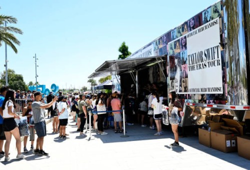 Inglewood, CA A crew of hard working people were busy filling orders as fans lined up by the thousands to purchase Taylor Swift merchandise at SoFi...