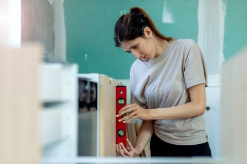 installing furniture - home decoration stock pictures, royalty-free photos & images