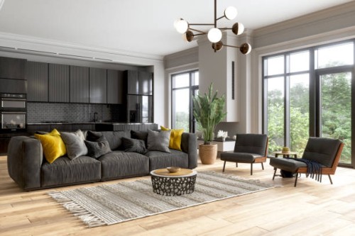 interior of modern living room with black color sofa, armchairs, potted plant and open plan kitchen. - home decoration stock pictures, royalty-free photos & images