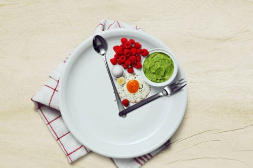 intermittent fasting conceptual - food stockfoto's en -beelden
