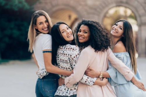 international frendship holding together - fashion stock pictures, royalty-free photos & images